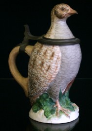 Appraisal: A Naples Capodimonte lidded beer stein in the form of