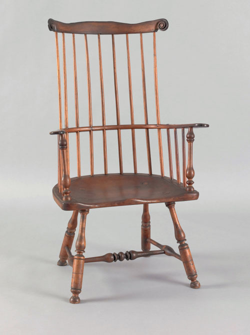 Appraisal: Philadelphia comb-back windsor armchair ca retaining an old varnished surface