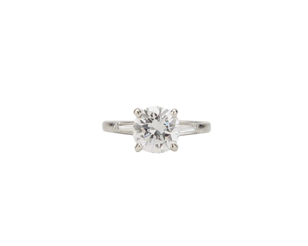 Appraisal: Platinum and Diamond Ring centering a four prong-set round brilliant-cut