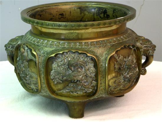 Appraisal: Japanese bronze planter with six cartouches embossed with birds and