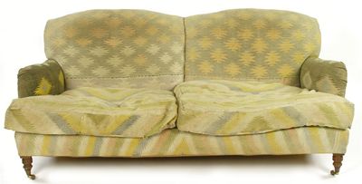 Appraisal: A two seater sofa with kelim style upholstery on turned