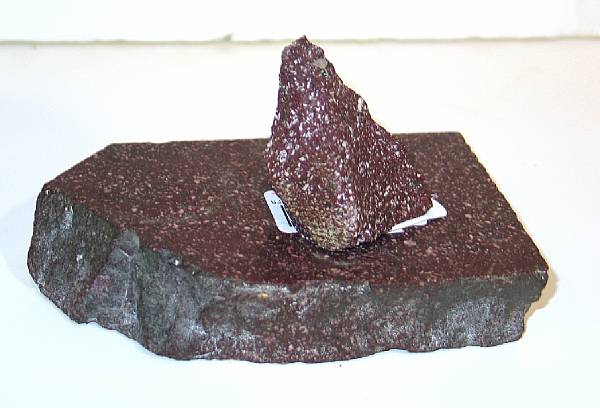 Appraisal: A porphyry fragment and porphyry shard By repute from Hadrian's