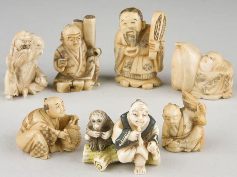 Appraisal: Seven Carved Japanese Netsuke th c five of ivory and