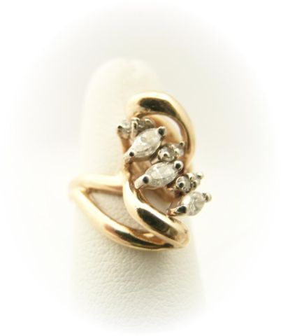 Appraisal: Lady's k yellow gold diamond ring with three marquise diamonds