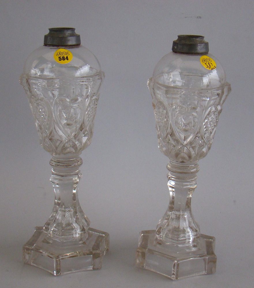 Appraisal: PAIR OF ANTIQUE AMERICAN CLEAR SANDWICH GLASS WHALE OIL LAMPS