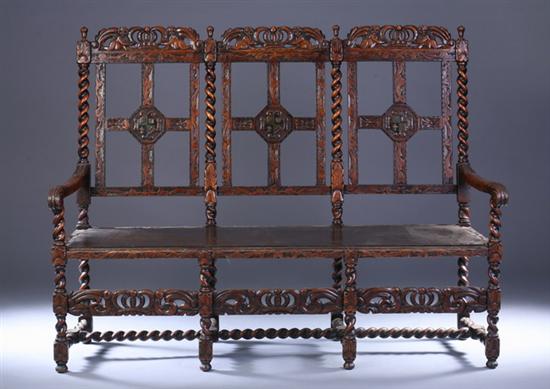 Appraisal: CHARLES II STYLE CARVED OAK TRIPLE CHAIR-BACK SETTEE th century