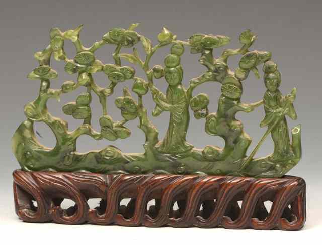 Appraisal: A CHINESE SPINACH JADE CARVED MODEL in the form of