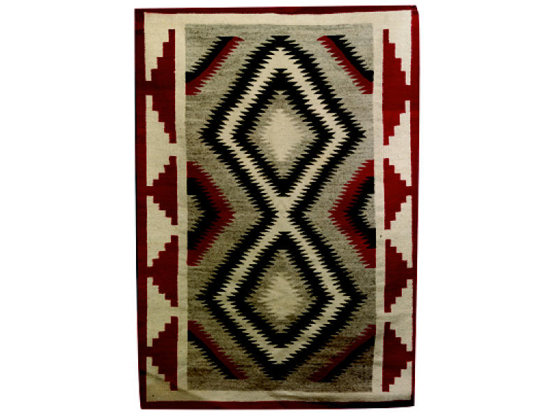 Appraisal: NAVAJO DOUBLE SADDLE BLANKET Serrated diamond pattern in alternating shades