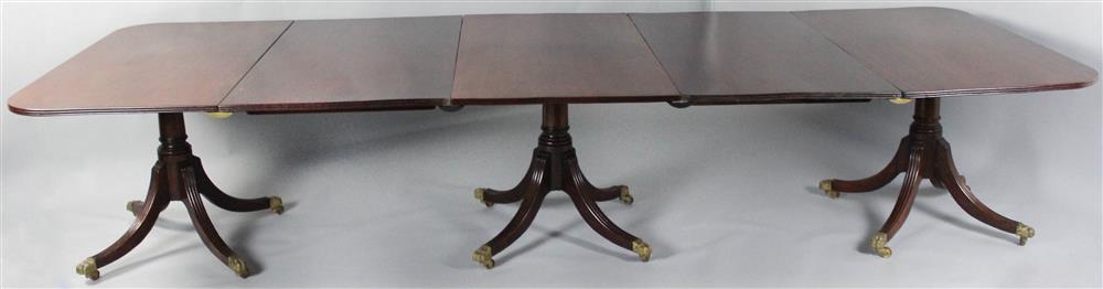 Appraisal: ENGLISH REGENCY CARVED MAHOGANY TRIPLE PEDESTAL DINING TABLE the rectangular