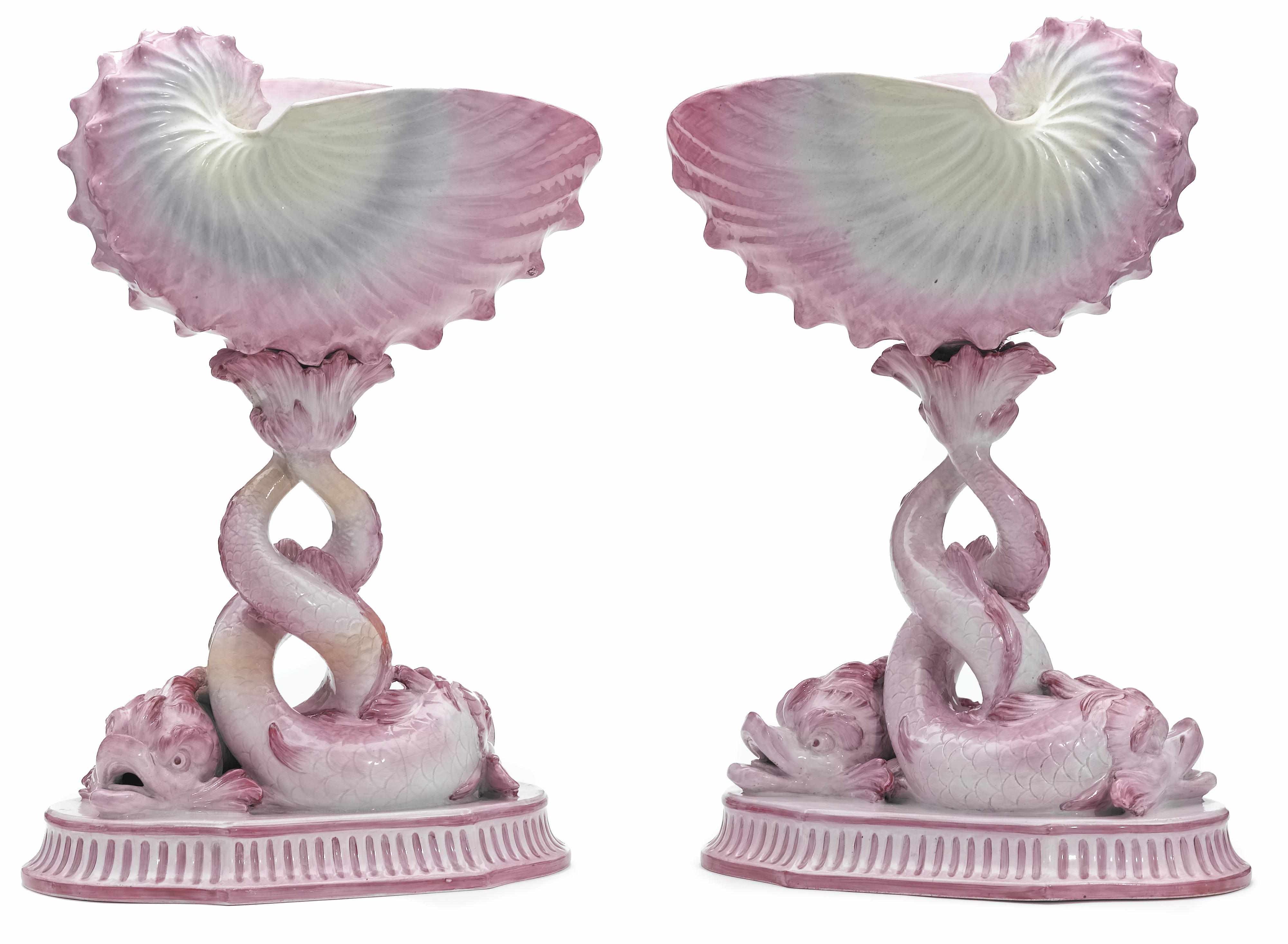 Appraisal: A pair of Wedgwood majolica dolphin and nautilus form centerpieces