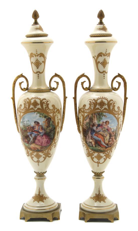 Appraisal: A Pair of Sevres Style Gilt Bronze Mounted Vases depicting