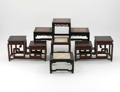 Appraisal: Five Chinese hardwood stands three inset with soapstone tops th