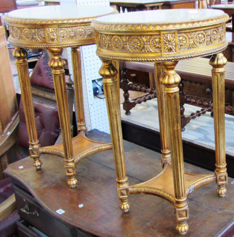 Appraisal: A pair of th century circular marble topped jardiniere stands