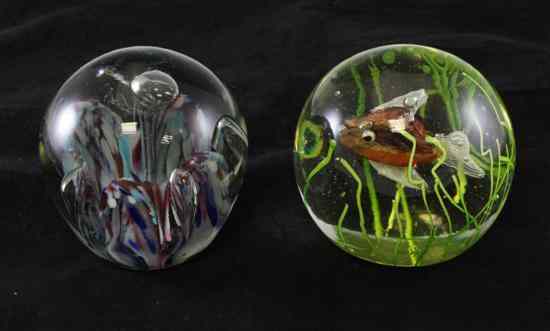 Appraisal: A Victorian glass dump paperweight with clear and polychrome mottled