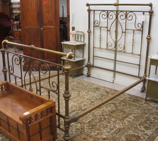 Appraisal: A VICTORIAN BRASS BED WITH RAILS American c full double