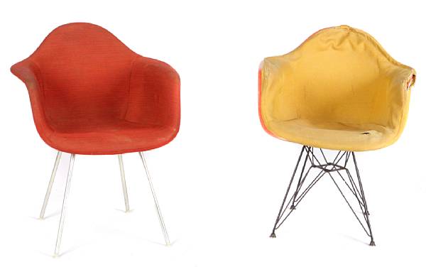 Appraisal: Two Charles and Ray Eames upholstered fibreglass shell armchairs for