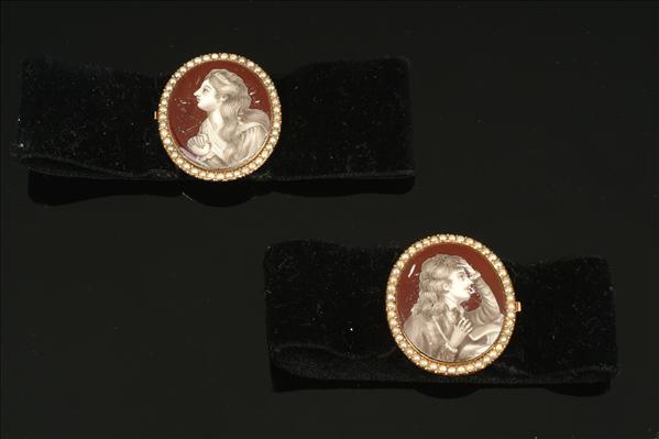 Appraisal: A pair of gold enamel and seed pearl clasps early