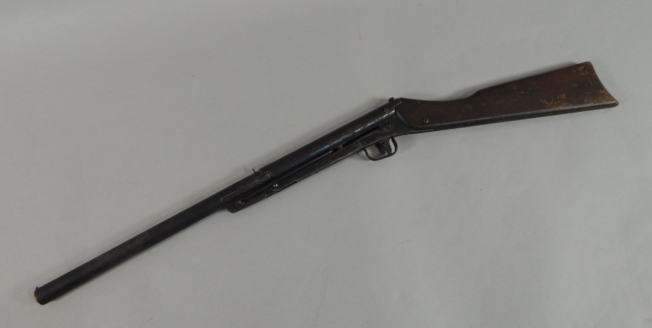 Appraisal: A child's type air rifle with stained beech stock unmarked