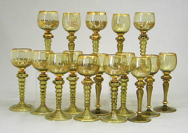 Appraisal: An assembled set of German gilt decorated amber-green rummers second