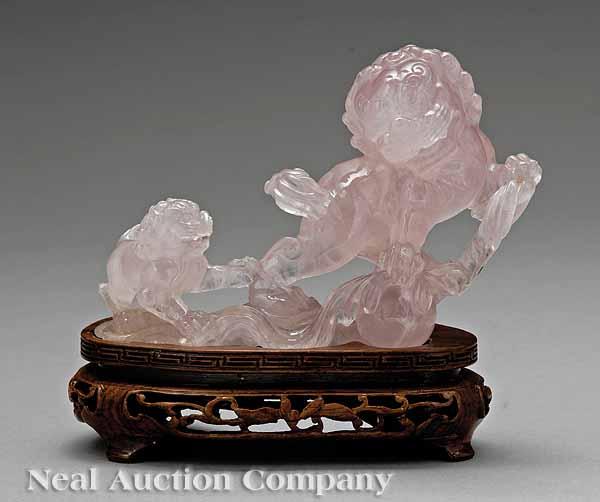 Appraisal: A Chinese Carved Rose Quartz Figural Group of a Buddhistic