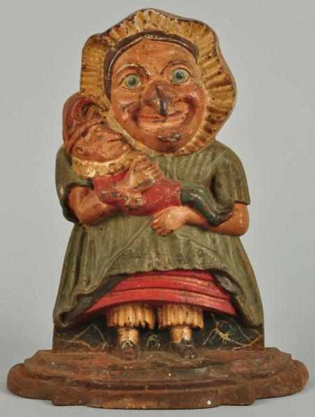 Appraisal: Cast Iron Judy Doorstop Description English Depicts Judy holding Punch