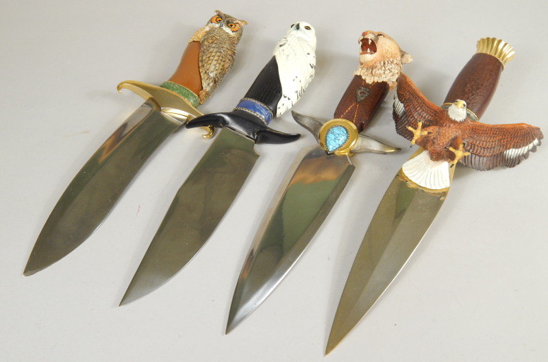 Appraisal: A modern hunting dagger decorated with a cold painted eagle