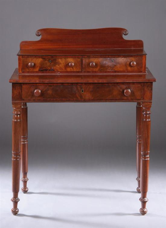 Appraisal: AMERICAN CLASSICAL MAHOGANY DRESSING TABLE Circa Raised backsplash above two