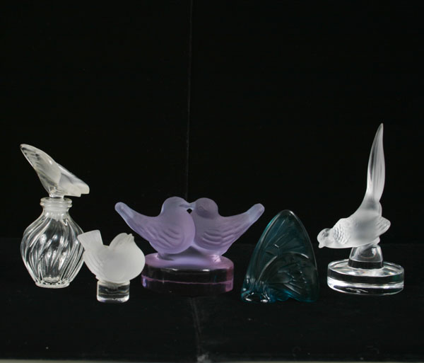 Appraisal: Lot of five pieces of Lalique including a perfume bottle