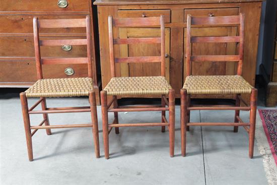 Appraisal: SIX SIDECHAIRS Ladderback chairs with woven seats '' h ''