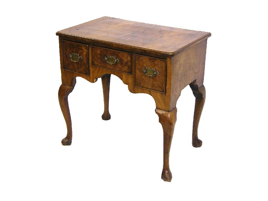 Appraisal: th century walnut lowboy the rectangular moulded top over three