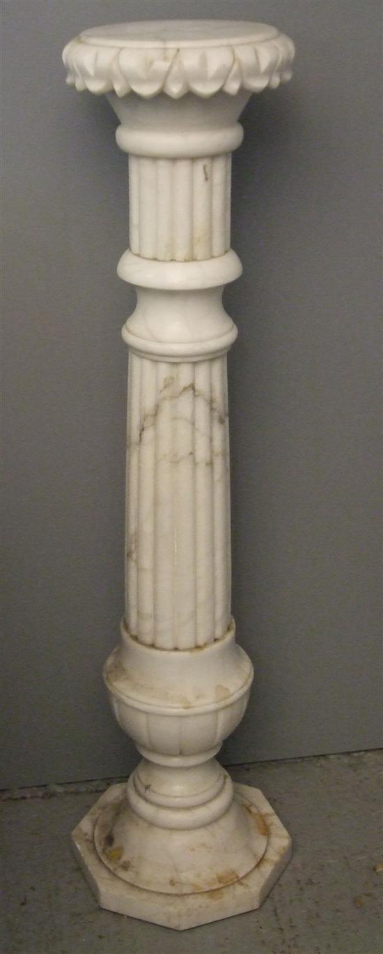 Appraisal: Variegated white marble pedestal on octagonal base high