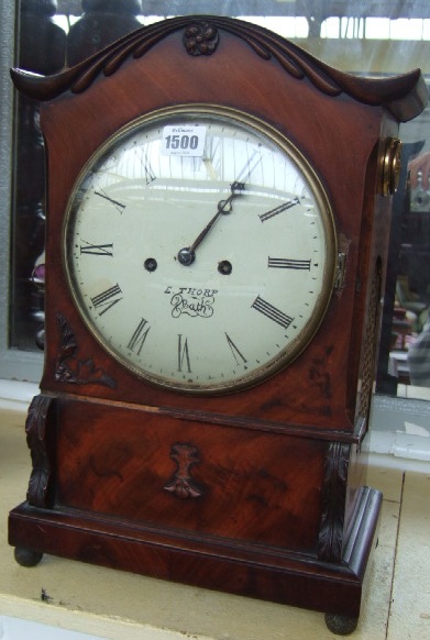 Appraisal: A mahogany cased eight day mantel clock th century the