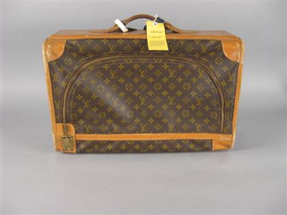 Appraisal: Louis Vuitton leather mounted soft suitcase With LV pattern and