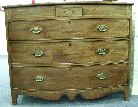 Appraisal: An early th Century mahogany bow front chest with secret