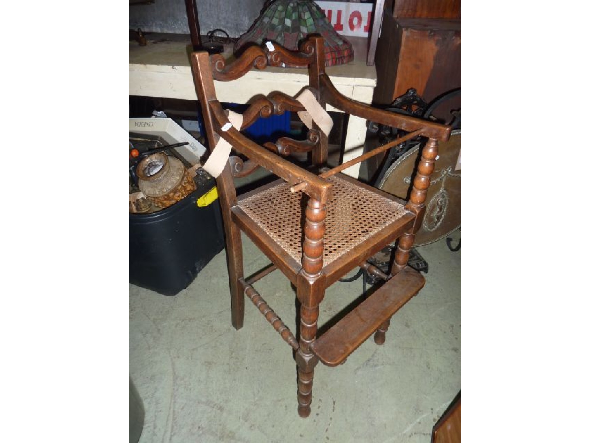 Appraisal: A child's high chair in the Carolean style with ladderback