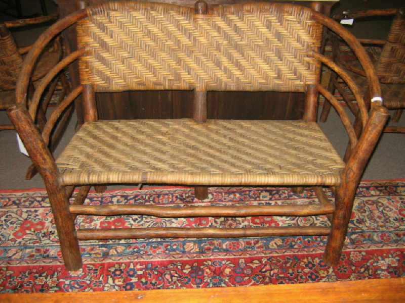 Appraisal: OLD HICKORY SETTEE Twig construction with bentwood arms having woven