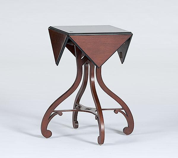 Appraisal: BAKER DROP LEAF TEA TABLE A late- th century mahogany