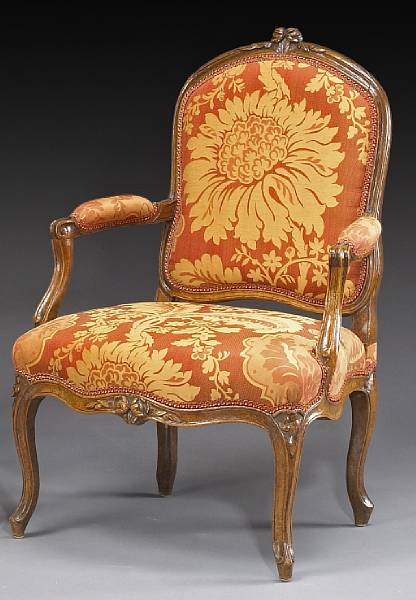 Appraisal: A Louis XV walnut fauteuil P J Blanchon mid th