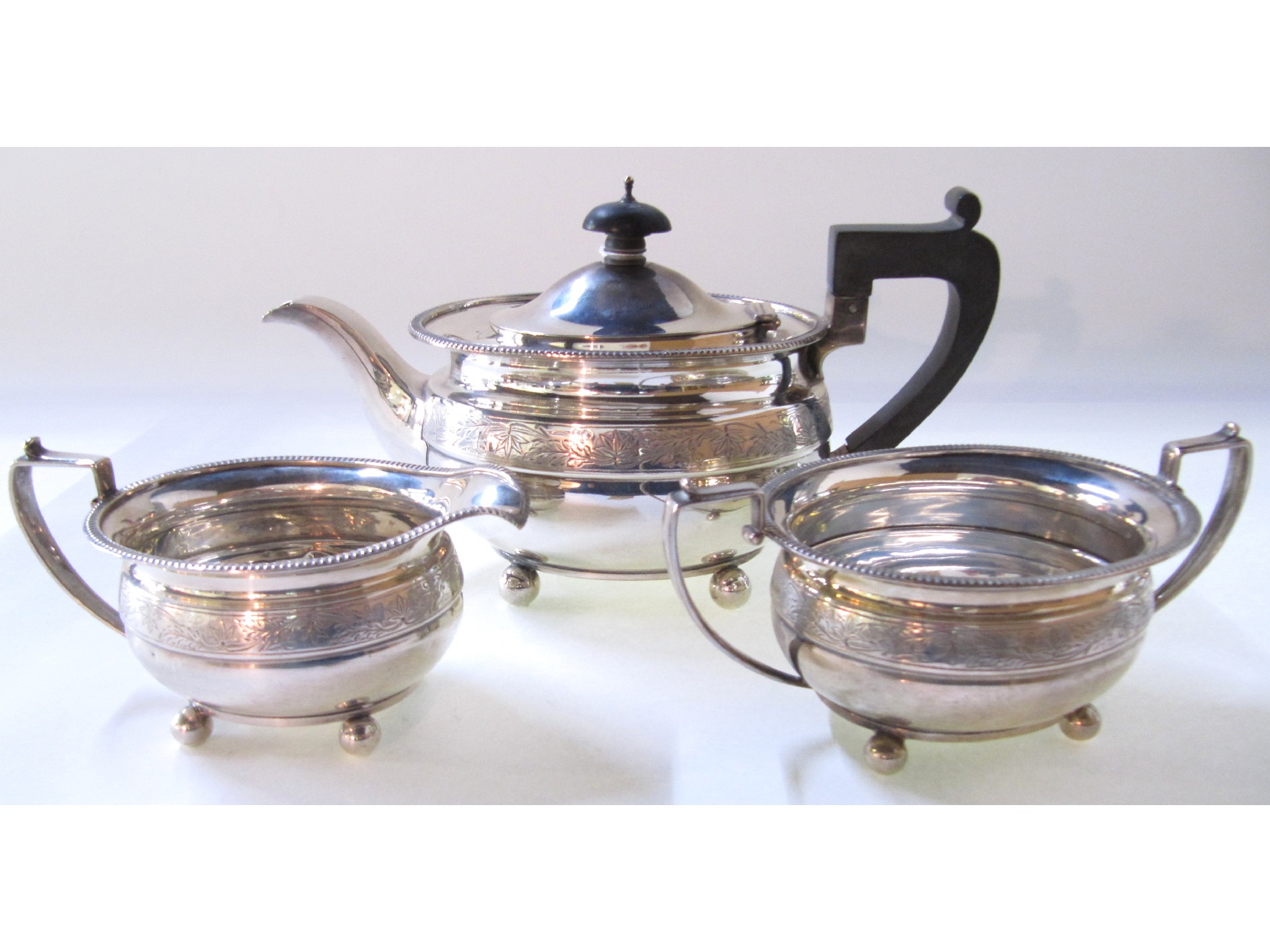 Appraisal: A three piece silver tea service Glasgow oz