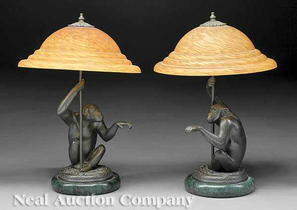 Appraisal: A Pair of Arts Decoratifs Patinated Metal Figural Lamps th