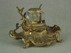 Appraisal: INKWELL ON STAND - VICTORIAN GILDED BRONZE SHELL FORM STAND