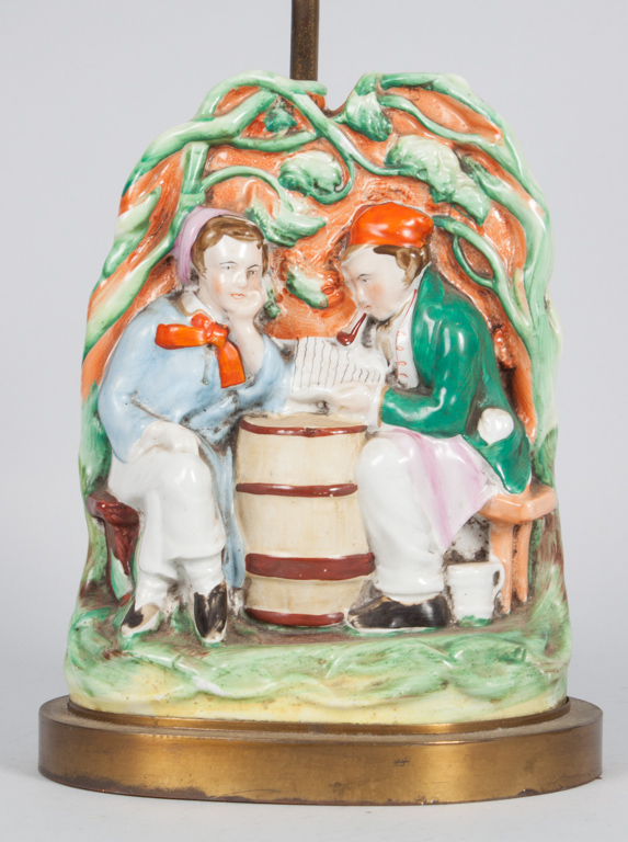 Appraisal: Staffordshire earthenware figural group lamp group modeled as two seated