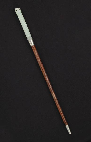 Appraisal: A jade and silver-mounted wood riding crop Qing Dynasty The