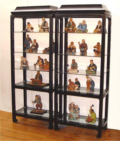 Appraisal: PAIR BLACK LACQUER ASIAN STYLE OPEN DISPLAY CABINETS Illuminated cabinets