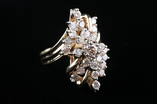 Appraisal: K YELLOW AND WHITE GOLD AND DIAMOND COCKTAIL RING full-cut