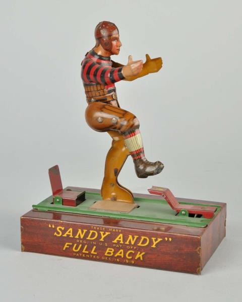 Appraisal: Sandy Andy Tin Litho Full Back Toy 's football player