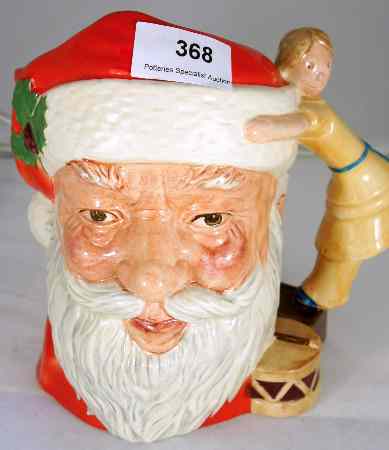 Appraisal: Royal Doulton Large Character Jug santa Claus D with Doll