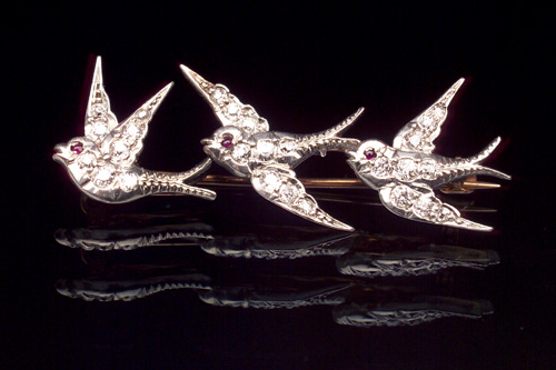 Appraisal: J E CALDWELL Swallow brooch with diamonds in platinum topped