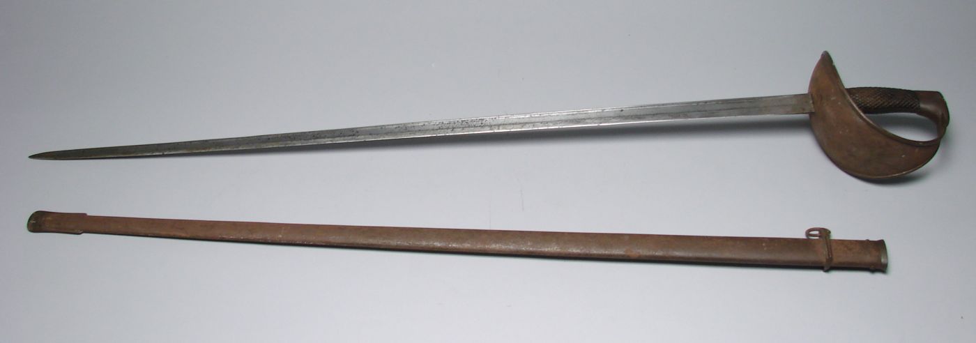 Appraisal: HEAVY CAVALRY SWORD AND SCABBARD Circa With rust and wear