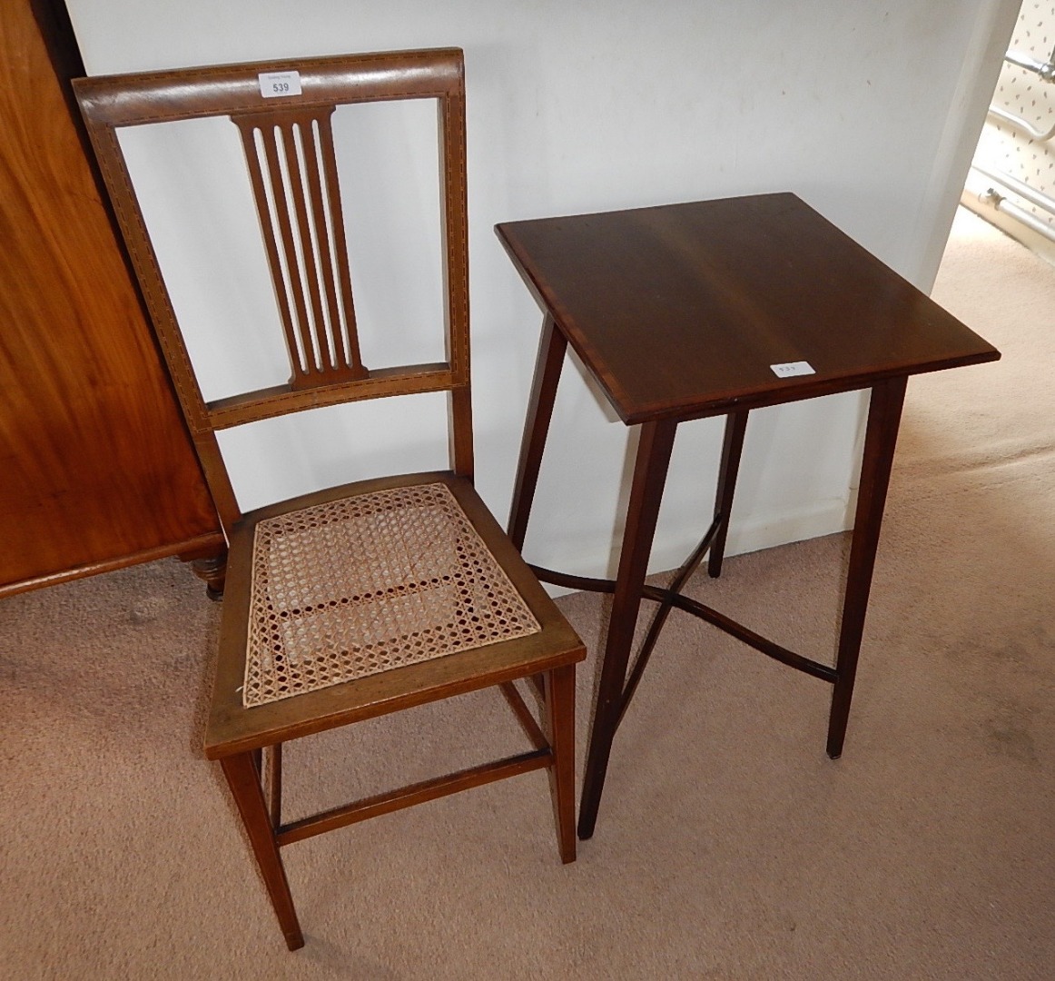 Appraisal: An Edwardian cane seated inlaid mahogany single chair and a